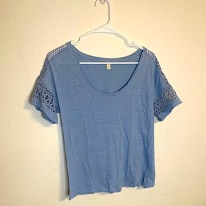 Gorgeous light blue short sleeve top with crochet detailing in small